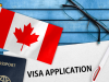 Canada Visa Application: Different Types of Canadian Visas & How to Apply Canada Visa Application with Canadian flag, passport, and documents.