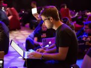 How Blogging Can Help Nigerian Students Win Scholarships or Build Study Abroad Portfolios. A blogger analyzing website traffic growth on a laptop screen with SEO charts and graphs.