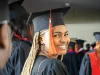 MBA Scholarships for Minorities: 15 Fully Funded Opportunities in 2026 A graduate smiling confidently in cap and gown, celebrating their academic achievement at a graduation ceremony, representing the success of minority students pursuing MBA scholarships.