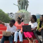 African students using laptops while developing digital and AI skills