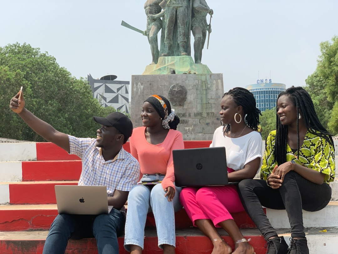 African students using laptops while developing digital and AI skills